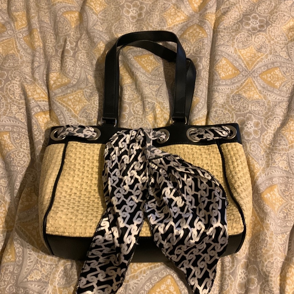 Black n brown wicker purse with scarf.
